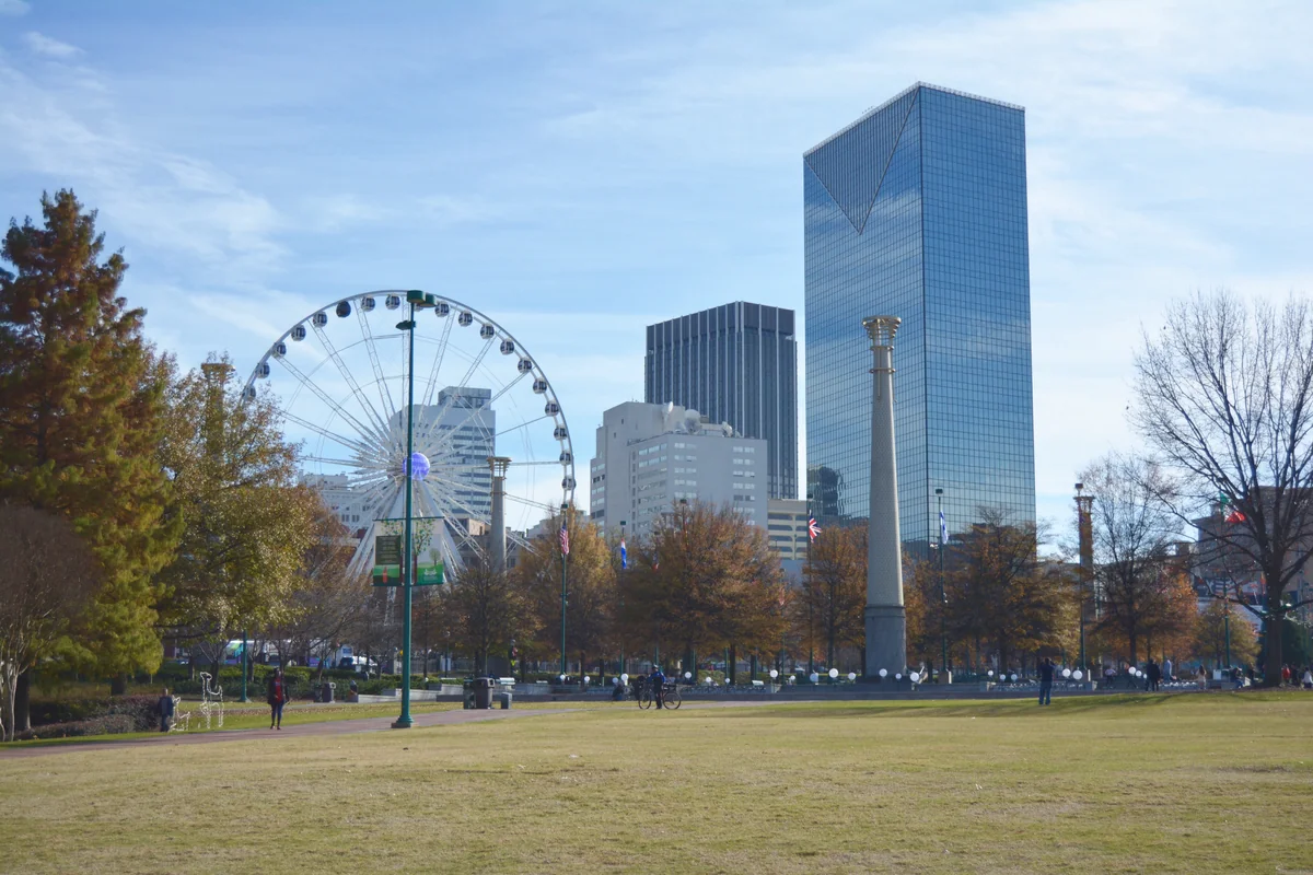 Centennial Olympic Park with the SkyView wheel and downtown Atlanta towers